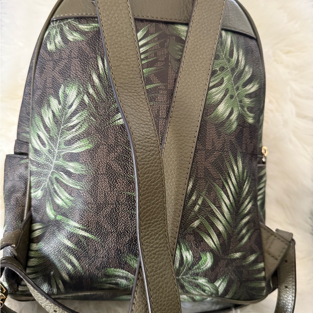 Michael Kors woman’s Backpack with Green Leaf Design.
Used good condition - Picture 4 of 5
